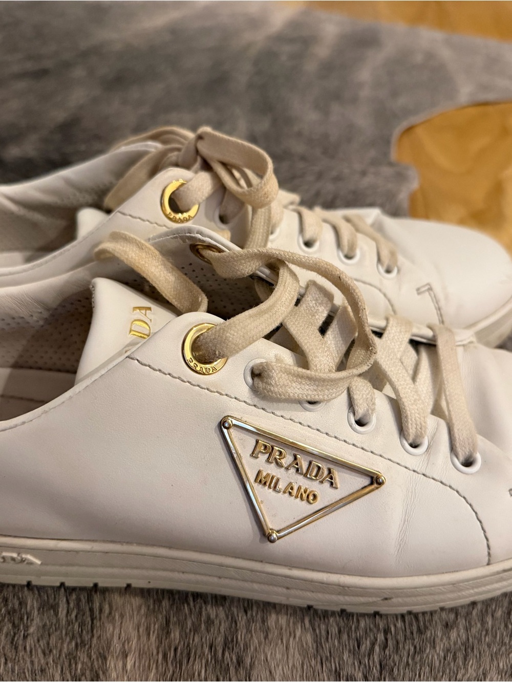 Prada White Leather Low-Top Sneakers. Moving out on April 30